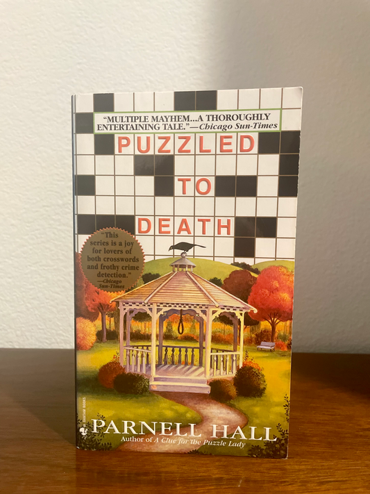 "Puzzled to Death" by Parnell Hall (Preowned Paperback)